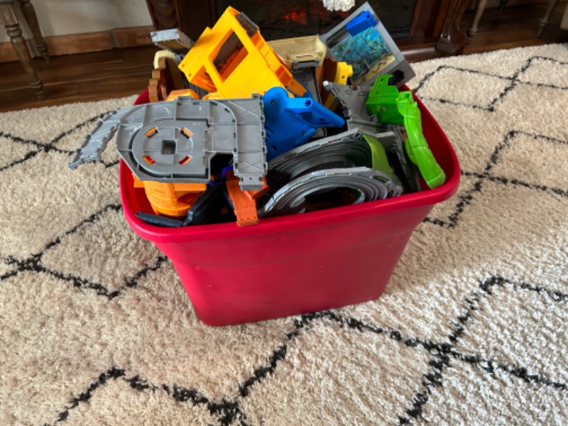 Photo 1 of large bin of Thomas and friends pirate parts and pieces unsure if complete