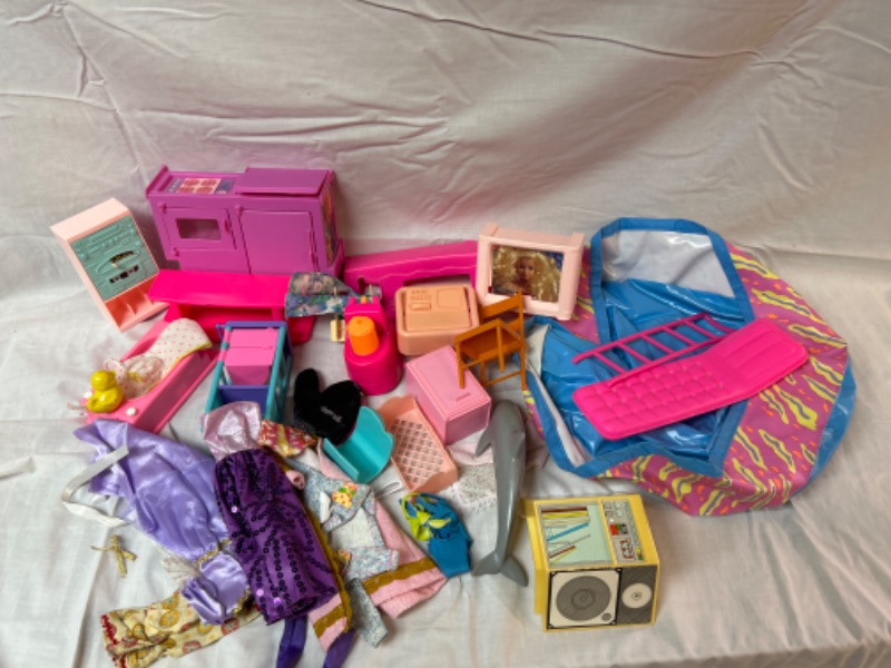 Photo 1 of Barbie parts and pieces clothes and more 