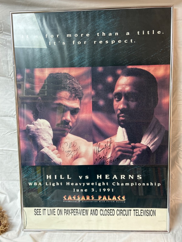 Photo 1 of Signed framed Boxing poster Hill vs Hearns signed by both fighters Measures 22 x 32 inches glass is cracked 