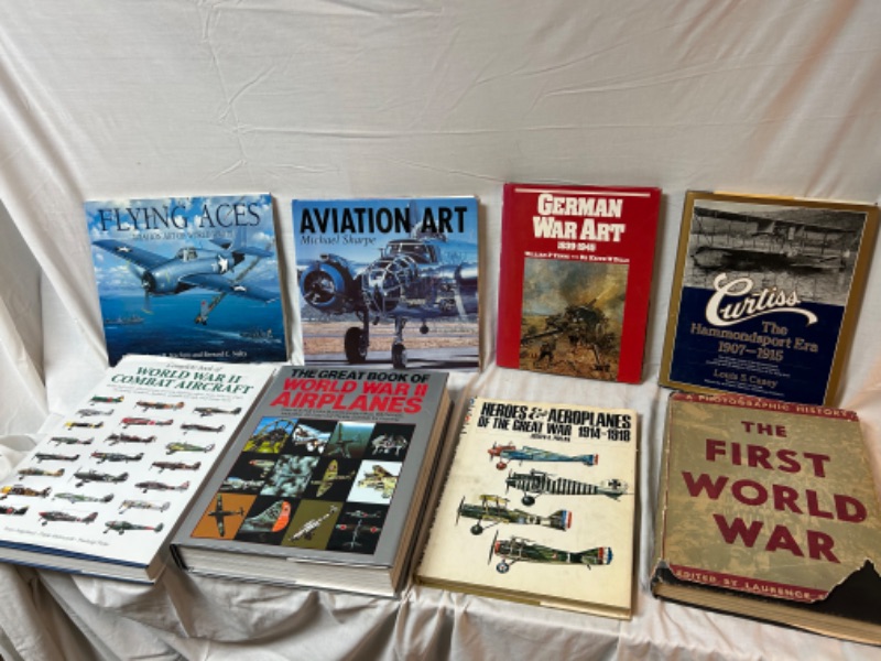 Photo 1 of Very large books about airplanes and war
