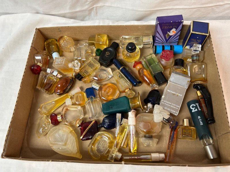 Photo 1 of Large lot of miniature perfume bottles, some of these spilled, bottles need to be cleaned