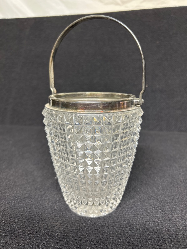 Photo 1 of Lead Crystal vase/pail with silver colored handle 9 inches tall to top of handle