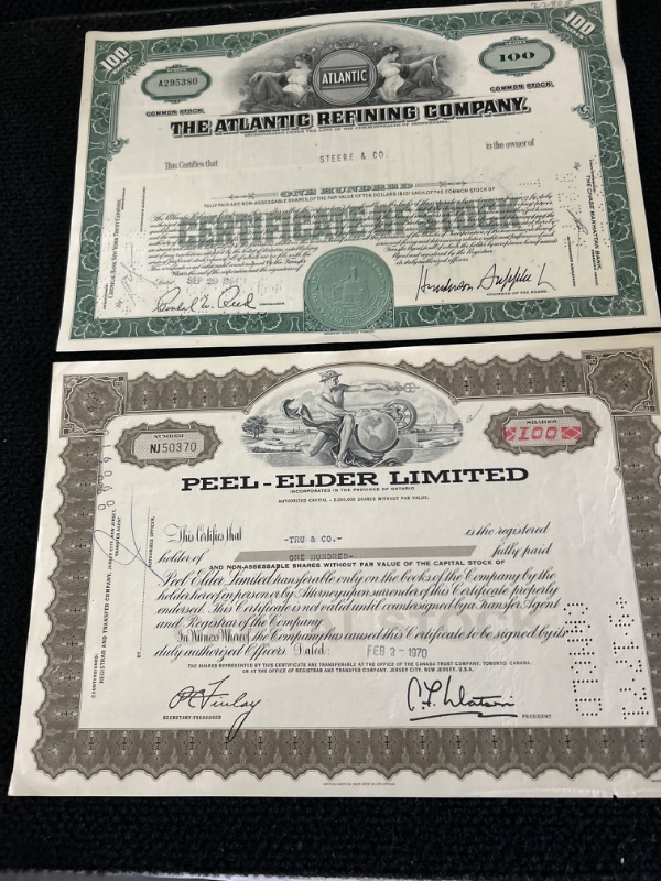 Photo 1 of 2 vintage stock certificates 