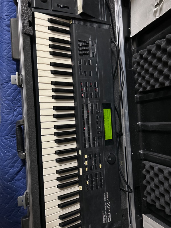 Photo 1 of Roland XP-60 music workstation in SKB roadcase powers on, no further testing 