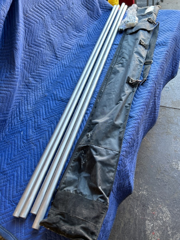 Photo 1 of Light weight 6 foot  metal sticks in travel bag marked Ninja sticks 