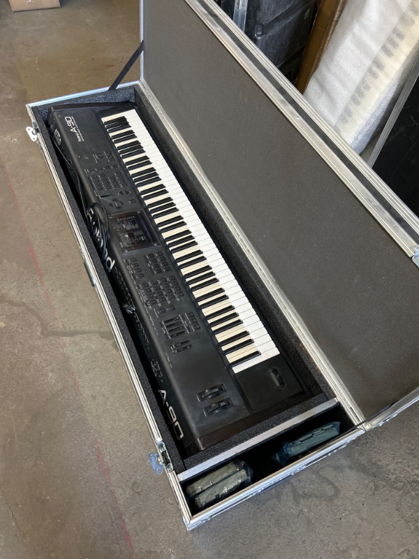 Photo 6 of Roland A-90 Expandable controller plugged in powers on no further testing in Heavy duty rolling road case measures 65 x 19 x 11 very heavy 