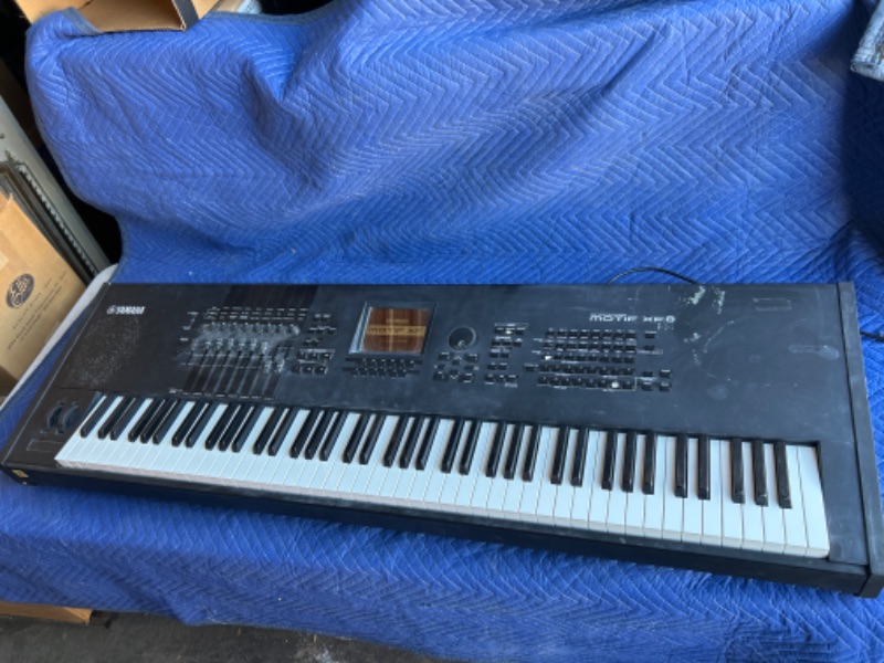 Photo 1 of Yamaha MOTIF XF8 Synthesizer Workstation 88 Weighted Key Keyboard plugged in powers on no further testing done dusty from warehouse 