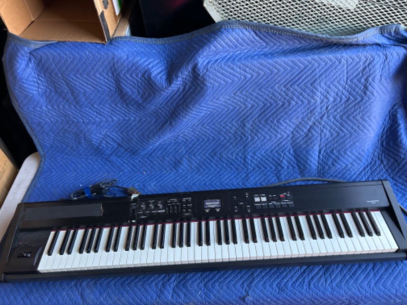 Photo 1 of Roland RD-300nx keyboard plugged in Powers up but POWER ADAPTER IS NOT INCLUDED no further testing 