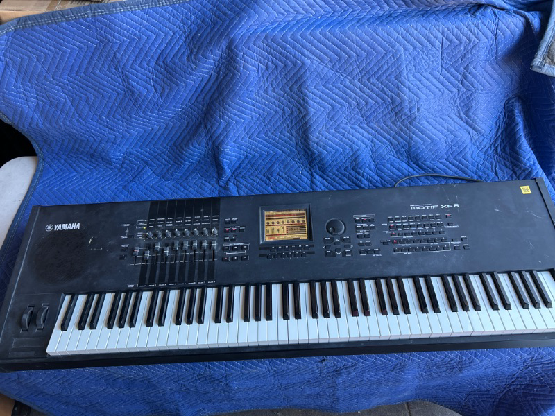 Photo 1 of Yamaha MOTIF XF8 Synthesizer Workstation 88 Weighted Key Keyboard plugged in powers on no further testing done dusty from warehouse 