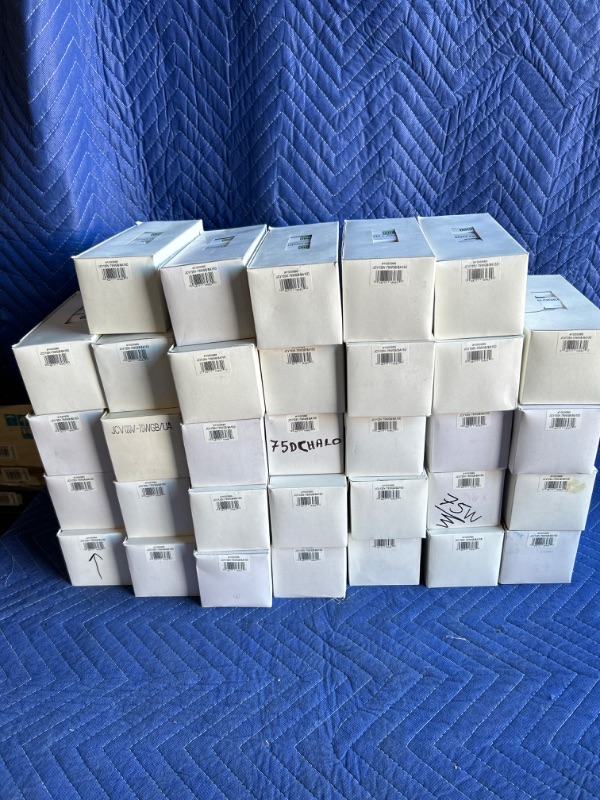 Photo 2 of 	
33 Boxes of 10 each New in boxes Ushio JCV120V-75WGB/BA15D light bulbs 330 Bulbs 