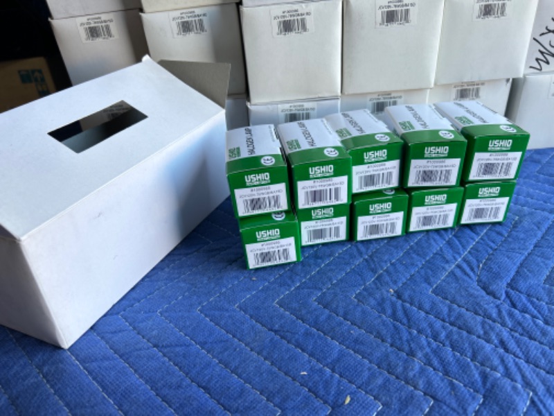 Photo 1 of 	
33 Boxes of 10 each New in boxes Ushio JCV120V-75WGB/BA15D light bulbs 330 Bulbs 