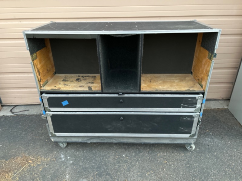 Photo 1 of Large rolling road case with drawers and shelves missing door measures 55 x 22 x 43 inches tall