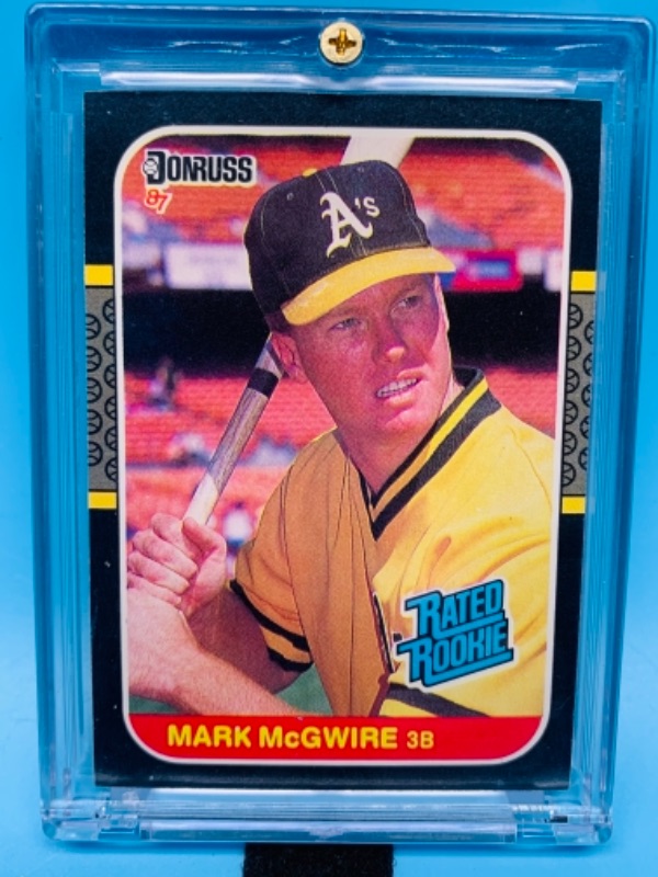 Photo 1 of 277718…donruss Mark McGwire rated rookie card 46 in hard plastic case