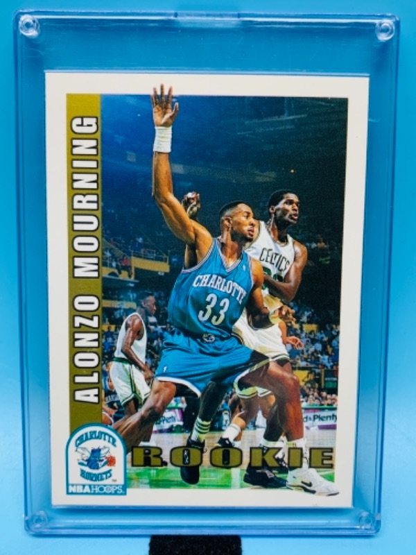 Photo 1 of 277719… skybox Alonzo mourning rookie card in hard plastic case 