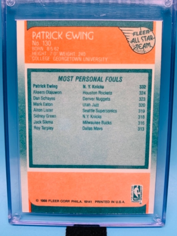Photo 2 of 277720…fleer 1988 Patrick Ewing card 130 in hard plastic case