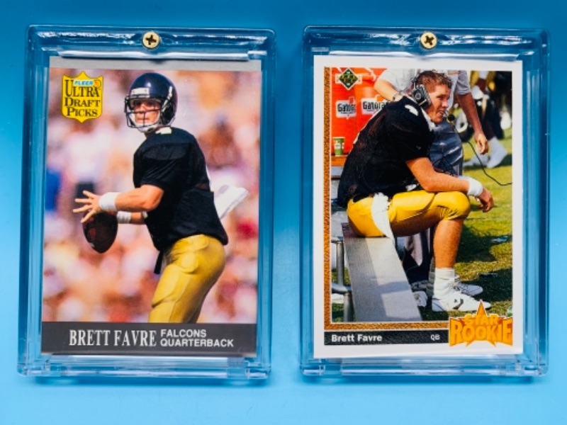 Photo 1 of 277731…two Brett Favre rookie cards and hard plastic cases- fleer ultra draft picks 283  and upper deck star rookie 13 