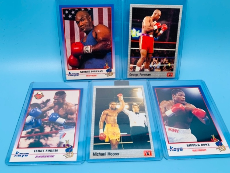 Photo 1 of 277735… five boxing trading cards in hard plastic sleeves