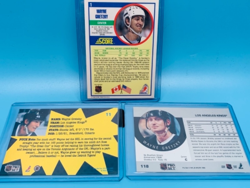 Photo 2 of 277737… three Wayne Gretzky trading cards in  hard plastic sleeves