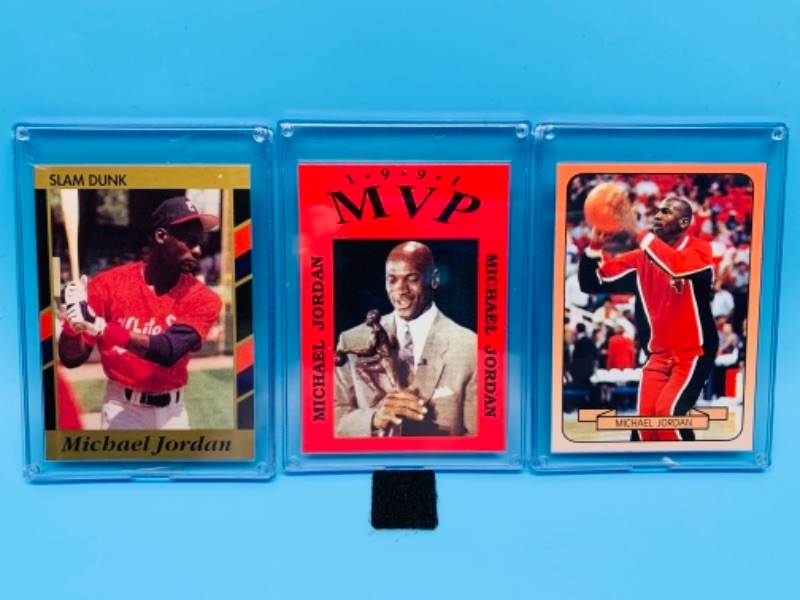 Photo 1 of 277740… three Michael Jordan trading cards in hard plastic cases