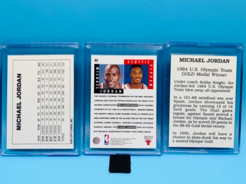 Photo 2 of 277741… three Michael Jordan trading cards in hard plastic cases