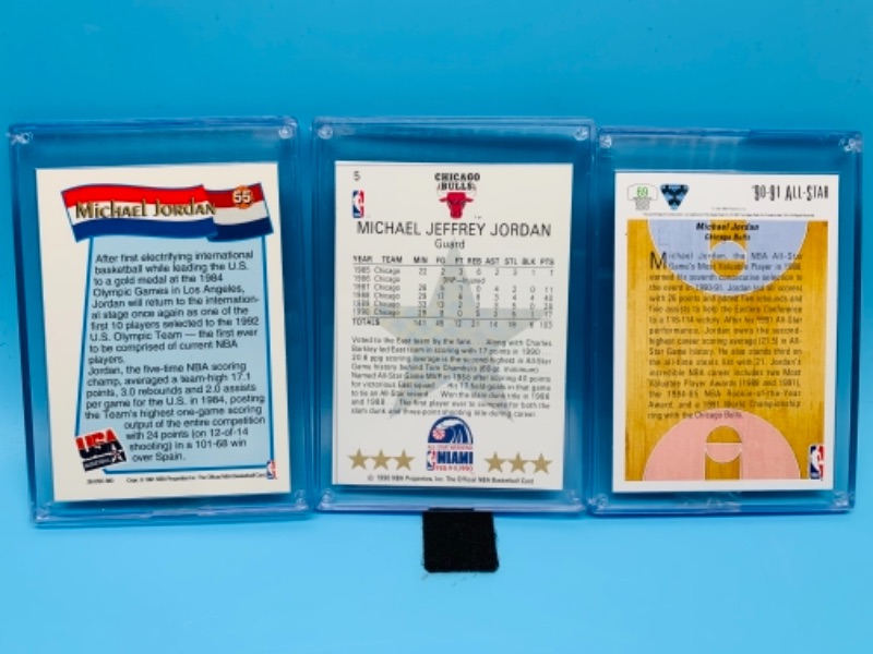 Photo 2 of 277742… three Michael Jordan trading cards in hard plastic cases