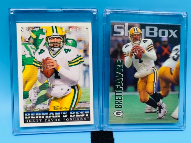 Photo 1 of 277744… two Brett Favre trading cards in  hard plastic cases