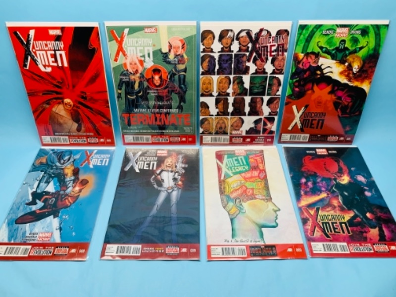 Photo 1 of 277758… eight X-Men comics in plastic sleeves