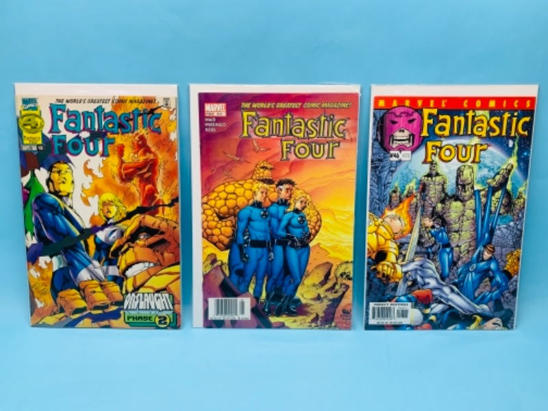 Photo 1 of 277769… three fantastic four comics in plastic sleeves