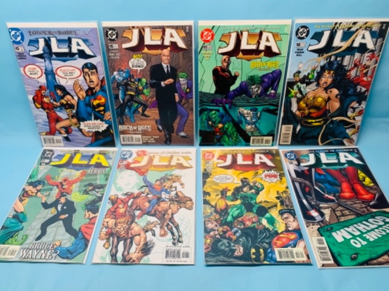 Photo 1 of 277773… eight justice league of America comics in plastic sleeves