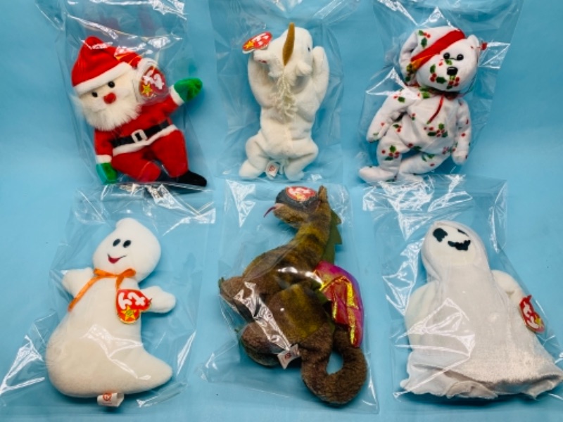 Photo 1 of 277830…6 specialty ty beanie babies in plastic bags 
