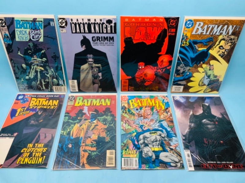 Photo 1 of 277856… eight Batman comics in plastic sleeves