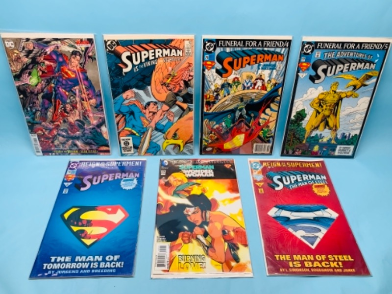 Photo 1 of 277865… seven superman comics in plastic sleeves