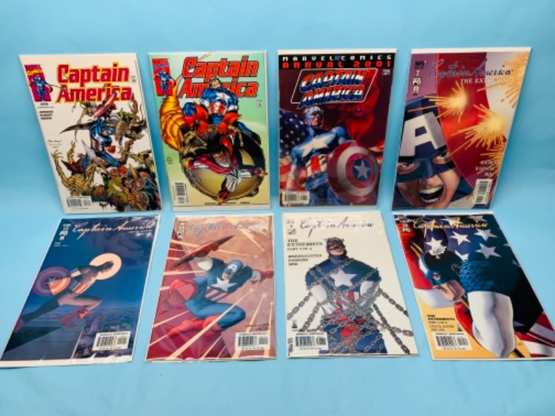 Photo 1 of 277868… eight captain America comics in plastic sleeves