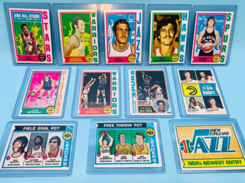 Photo 1 of 277905…12 vintage late 1960’s- early 1970’s basketball trading cards in hard plastic sleeves 