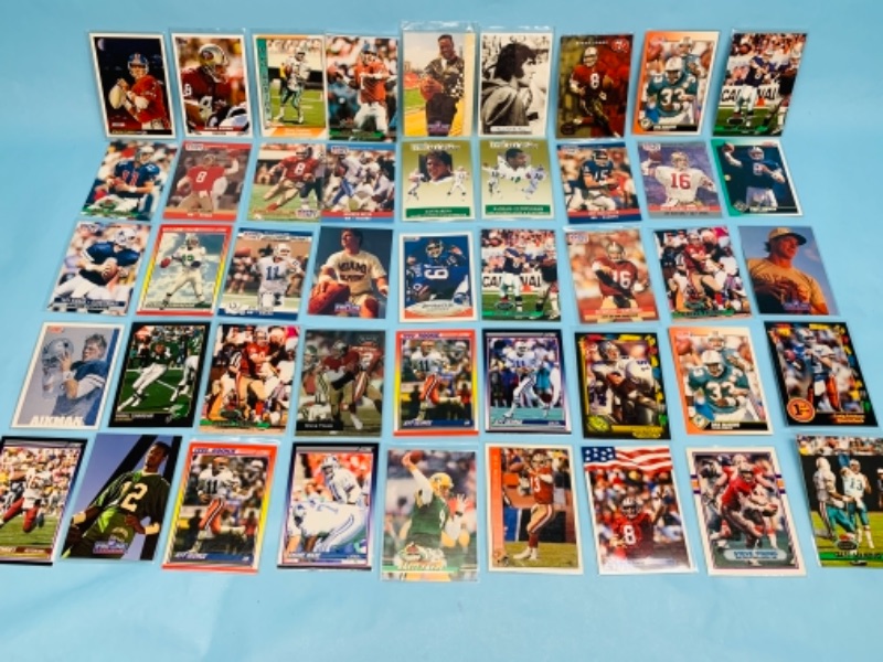 Photo 1 of 277956…45 nfl quarterback trading cards in plastic sleeves 