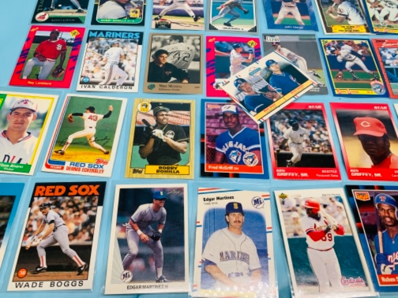 Photo 1 of 277957…75 mixed baseball trading cards in plastic sleeves 