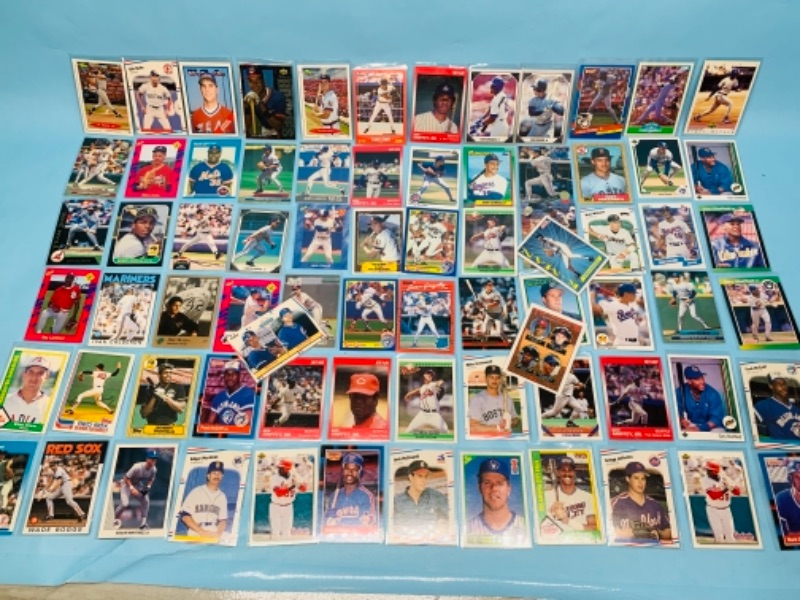 Photo 1 of 277957…75 mixed baseball trading cards in plastic sleeves 