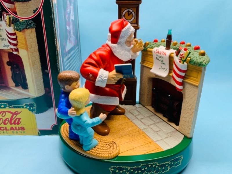 Photo 2 of 277966…vintage Coca Cola Santa Claus die cast and plastic mechanical bank with original box 