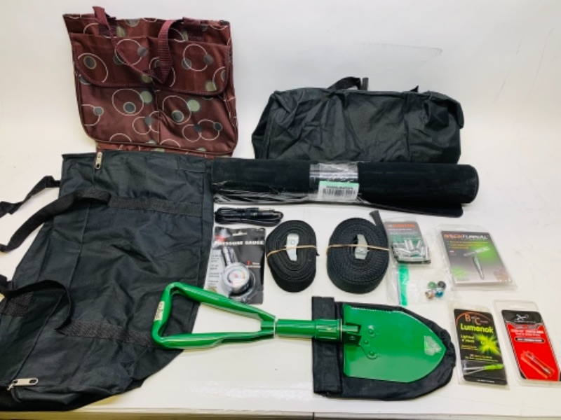 Photo 1 of 278008…folding camp shovel, carry bags, bow and arrow accessories, pressure gauge , mat, and more 