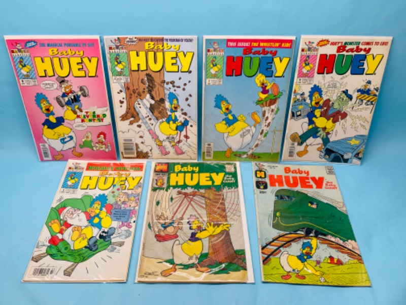 Photo 1 of 278054…7 vintage baby Huey comics in plastic sleeves $.10 - $1.50 some show wear from age 