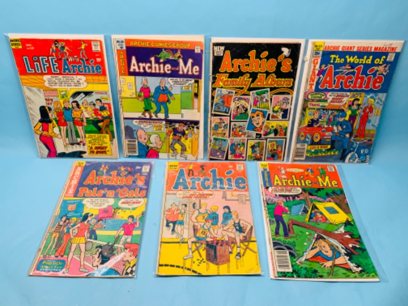 Photo 1 of 278056…7 vintage Archie comics in plastic sleeves- shows wear from age- tares and  bends