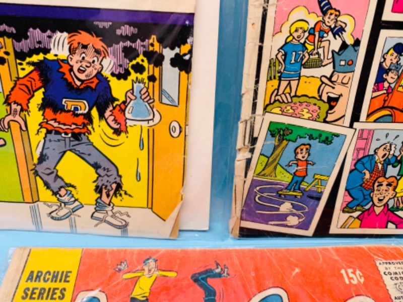 Photo 2 of 278056…7 vintage Archie comics in plastic sleeves- shows wear from age- tares and  bends