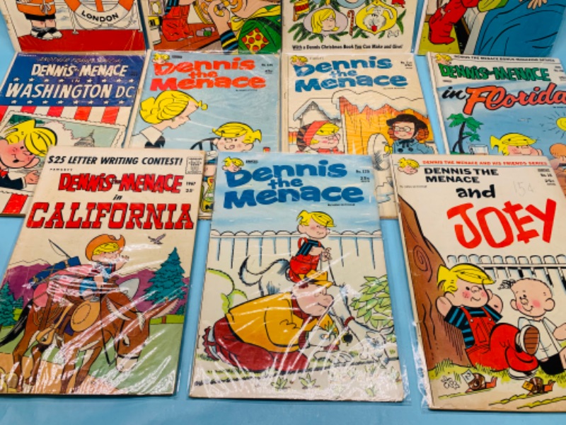 Photo 4 of 278061…11 vintage Dennis the Menace comics in sleeves shows wear  from age - tares and bends