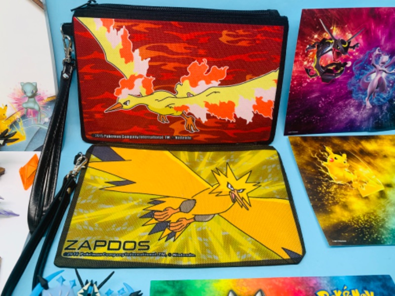 Photo 3 of 278141…Pokémon notepads, pencils, stickers, dice, figures, carry pouches and more