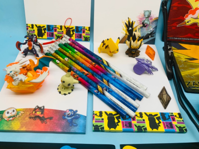 Photo 2 of 278141…Pokémon notepads, pencils, stickers, dice, figures, carry pouches and more