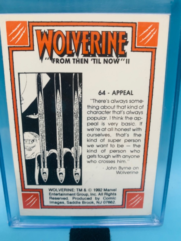 Photo 2 of 278144…1992 marvel Wolverine card 64 in hard plastic case 