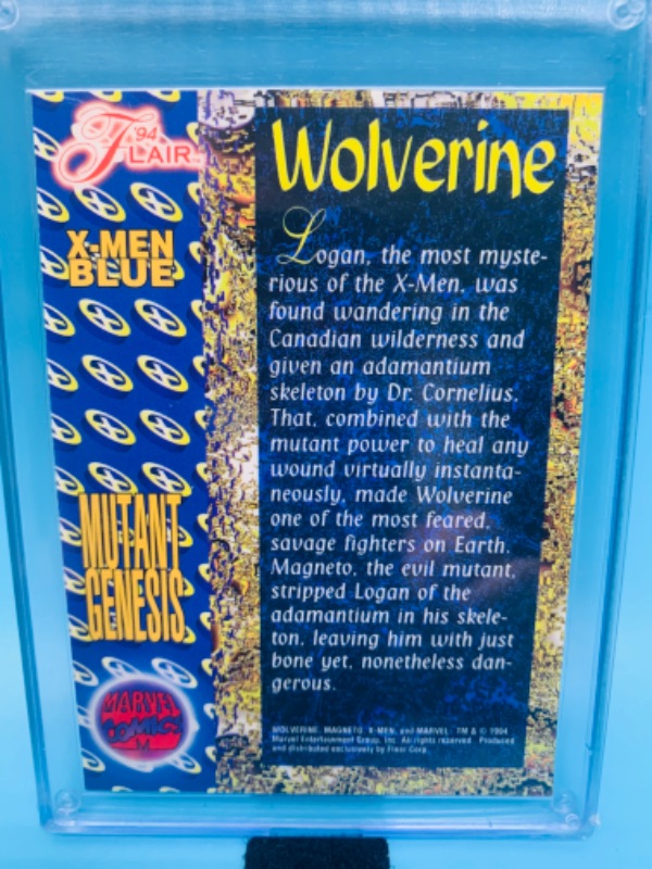 Photo 2 of 278154…flair 1994 Wolverine card in hard plastic case 