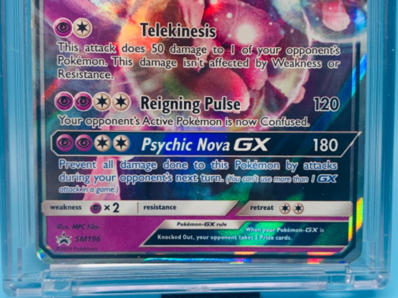 Photo 2 of 278168…Pokémon mewtwo GX holo card SM196 in hard plastic case 