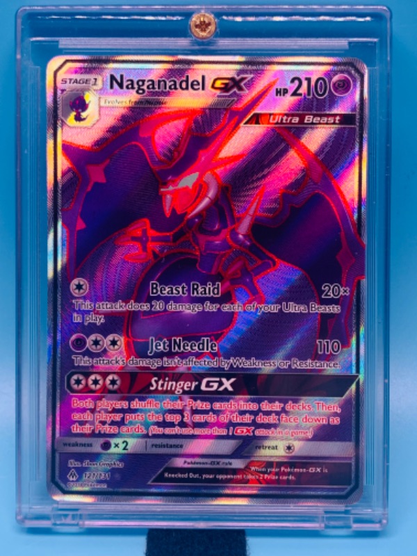 Photo 1 of 278169…Pokémon naganadel GX holo card 121/131 in hard plastic case 