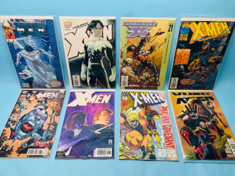 Photo 1 of 278205… eight X-Men comics in plastic sleeves